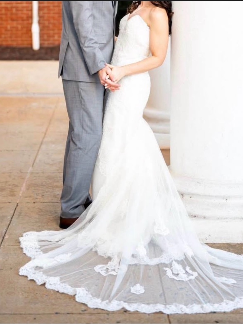 Lace sweetheart A-line wedding dress in ivory with long train
